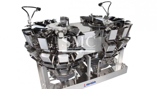 Ishida designer wins Inventors Award for oval-shaped 18-head multihead weigher